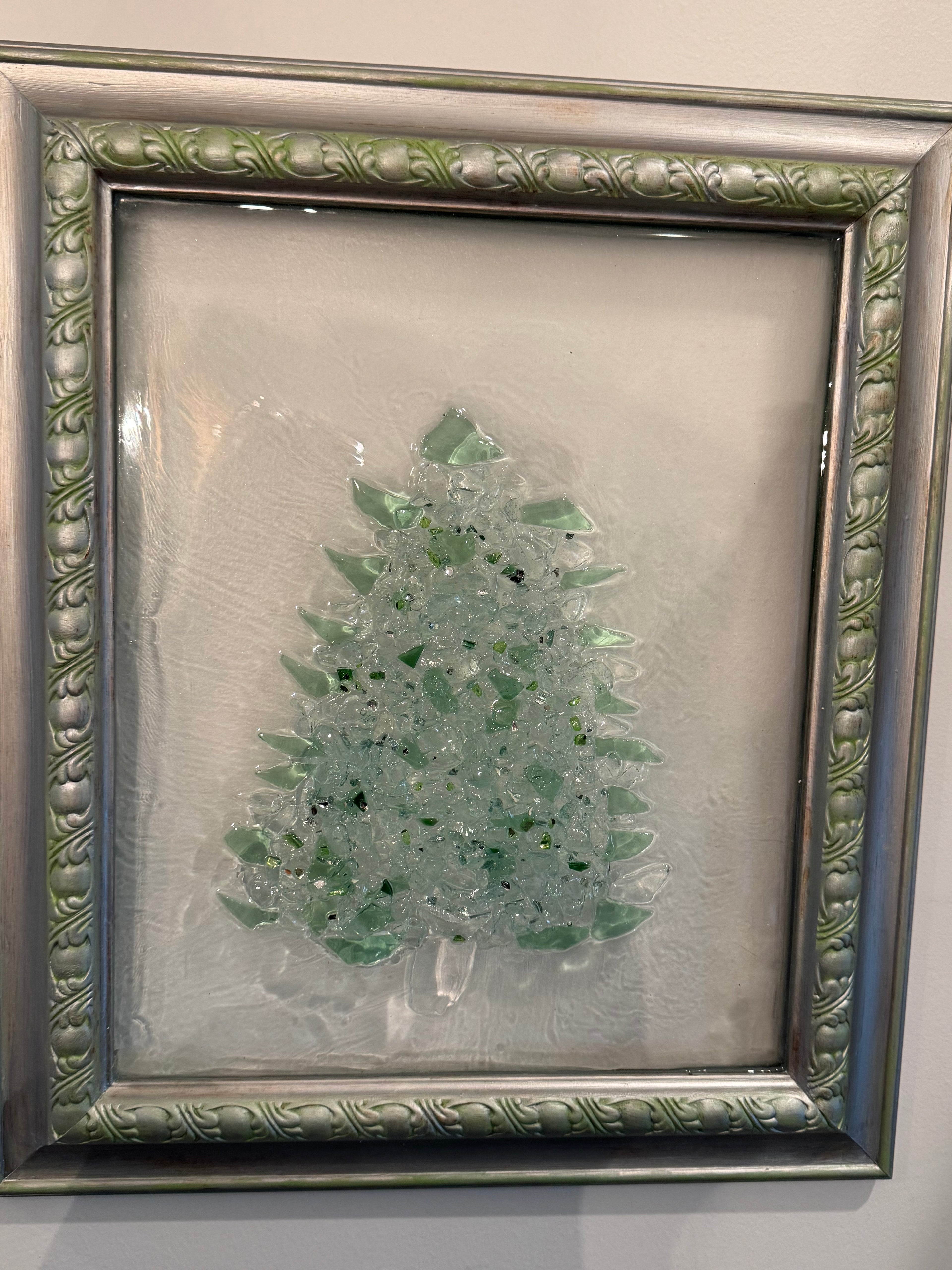 Large green and silver Christmas tree